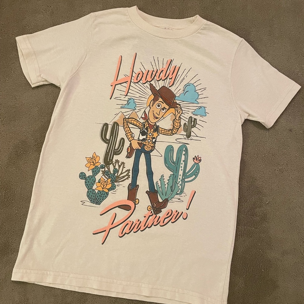 Disney Toy Story Woody short-sleeved t-shirt. Great used condition. Size 7/8.